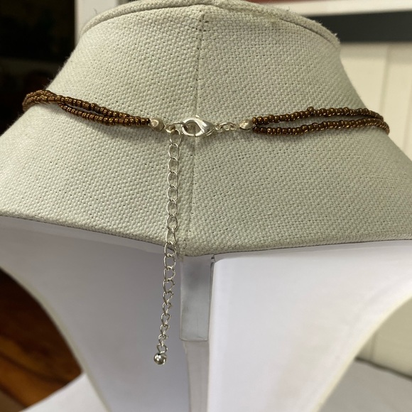 Unique artisan style neutral tones necklace - Picture 4 of 7